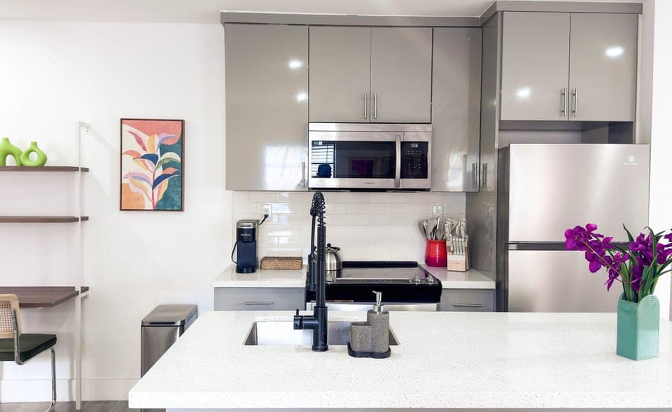 A bright, inviting kitchen designed for easy meals, coffee rituals, and feeling right at home.