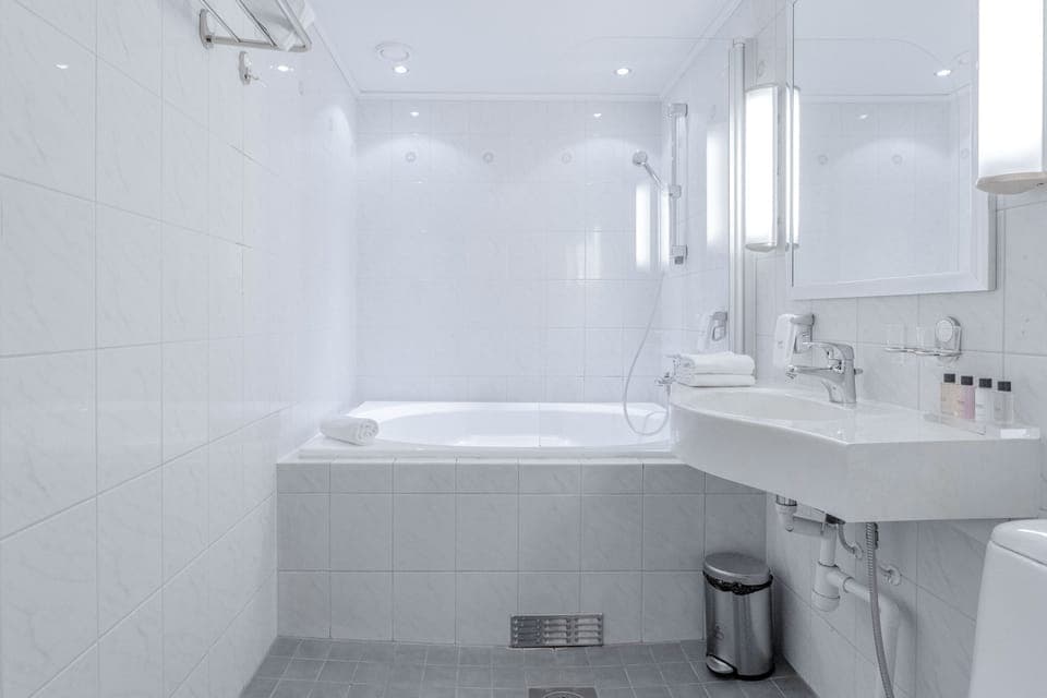 Superior King Room with Bath(Family use, 2 adults + 2 children) | Bathroom | Hair dryer, heated floors, towels, soap