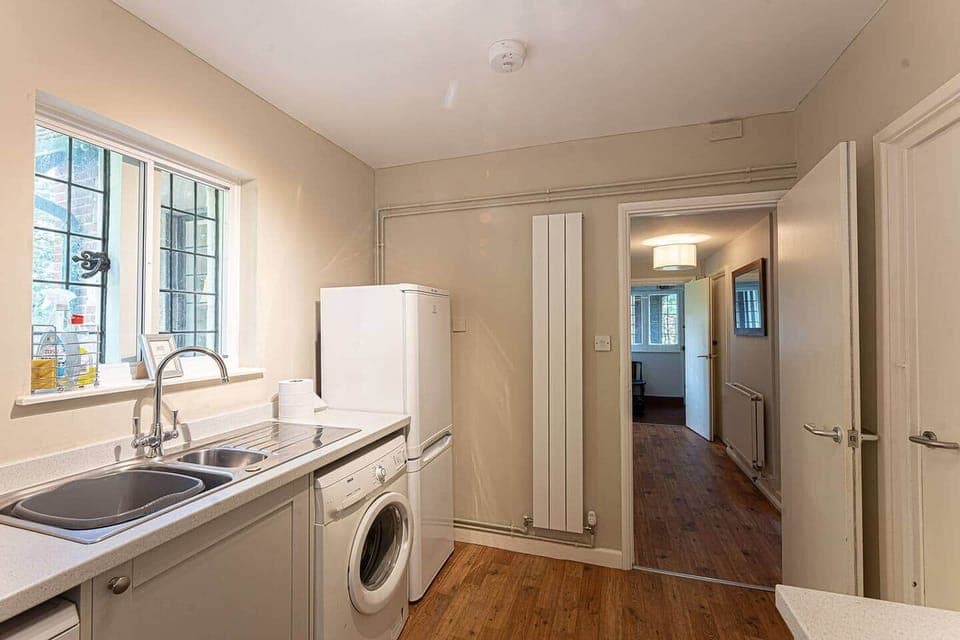 Kitchen with everything you'll need, including a washing machine