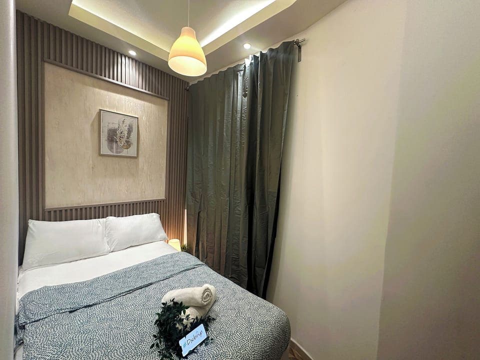 Economy Double Room, Balcony, City View | Desk, laptop workspace, iron/ironing board, free WiFi