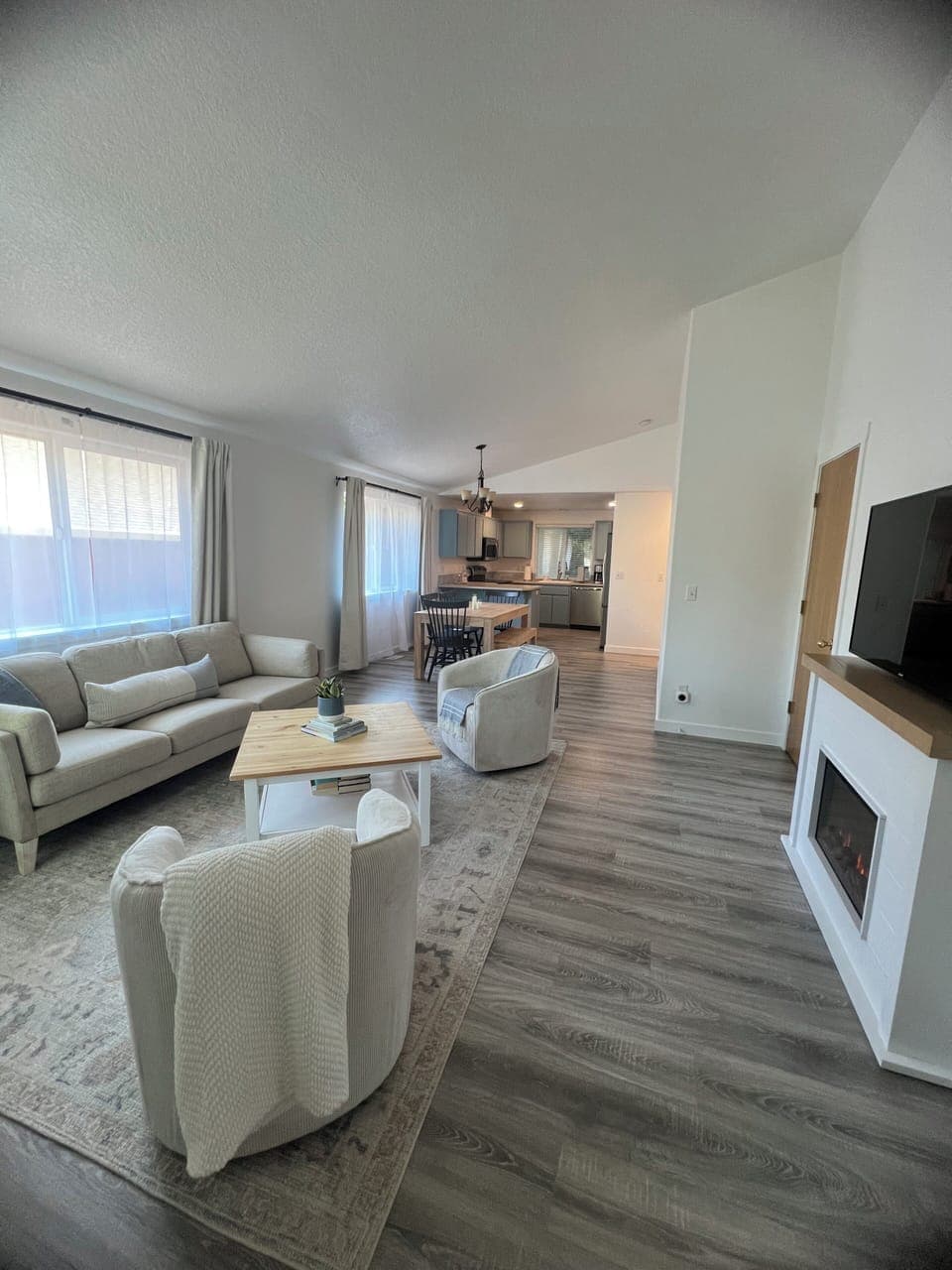 Open concept living, dining and kitchen.