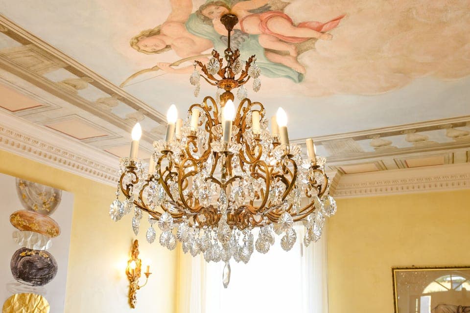 Period details at Villa Bugatti, Desenzano. Marriott standard (2025). Stay 6+ nights and receive a complimentary train ticket to Venice. Experience the noble charm of Lake Garda.