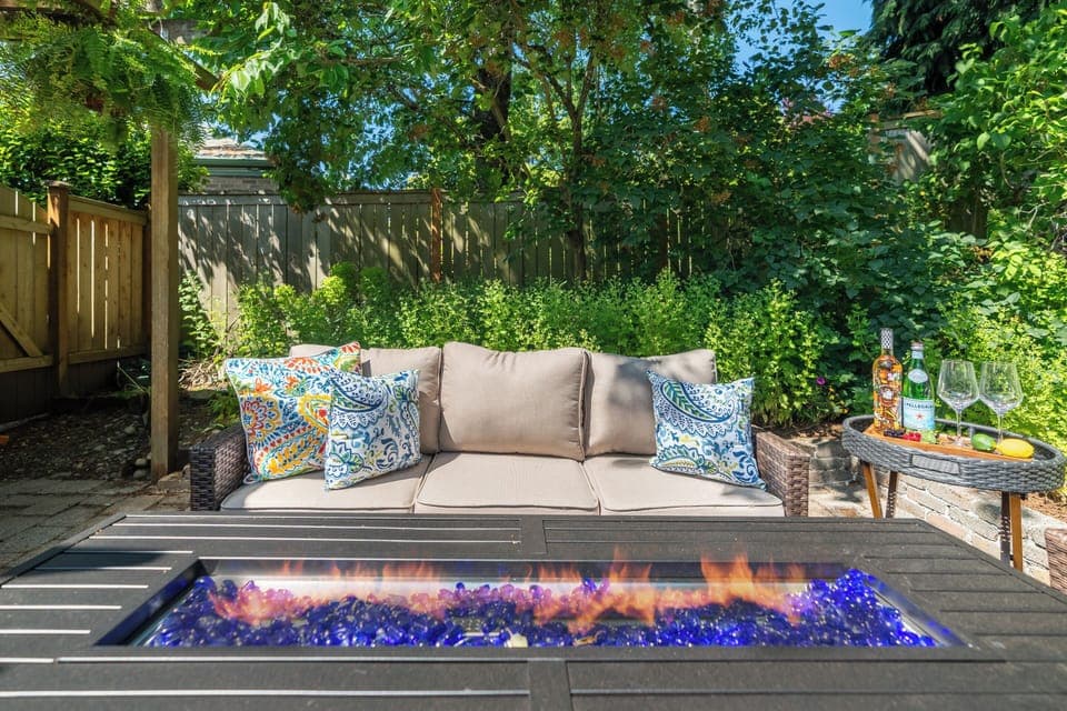 Gather around the modern fire table and enjoy the peaceful outdoor setting.