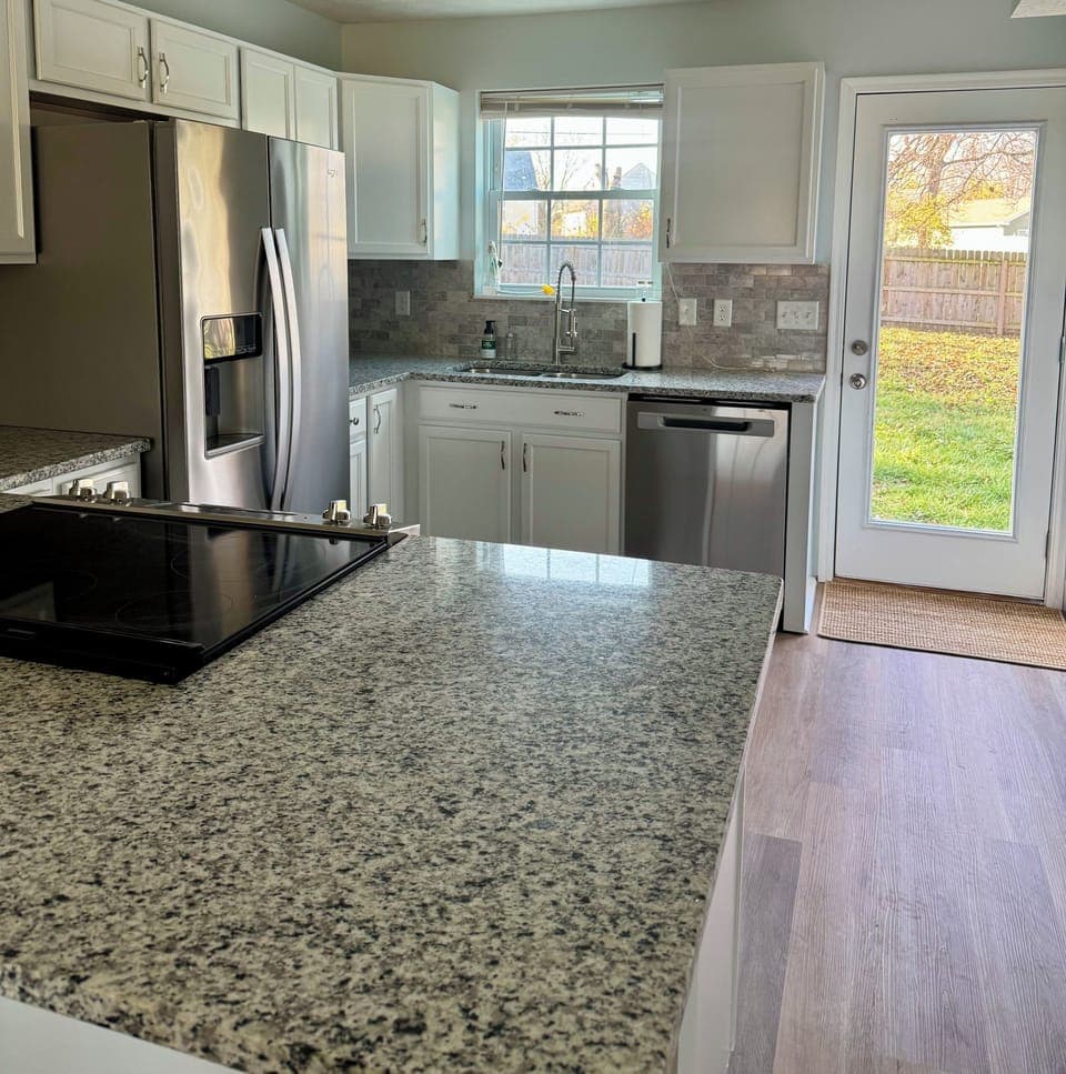 Brand new appliances with granite countertops
