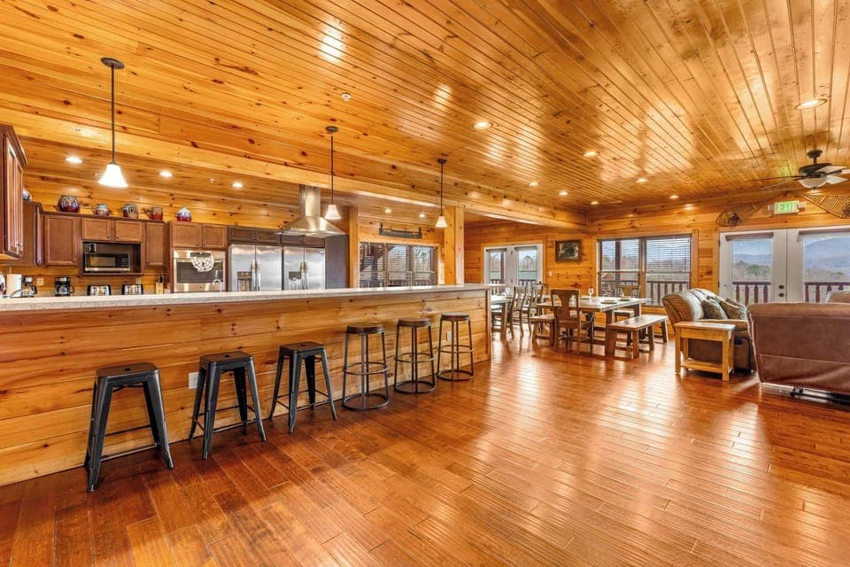 Massive open living, dining, and kitchen area perfect for the whole crew!