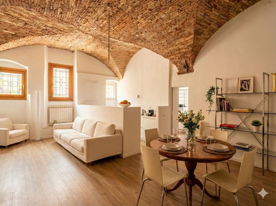 Deluxe Apartment, Garden View | Living area | 65-inch Smart TV with digital channels