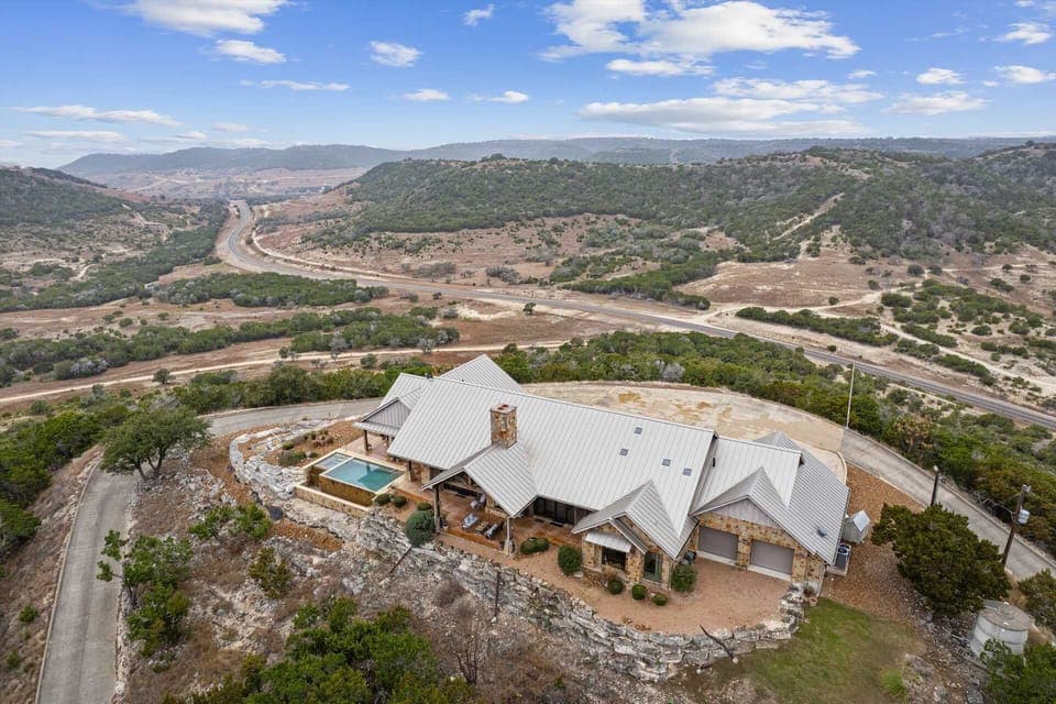 Perched high above rolling hills, this stunning vacation retreat offers breathtaking panoramic views, ultimate privacy, and a perfect blend of luxury and nature-your peaceful escape above it all.