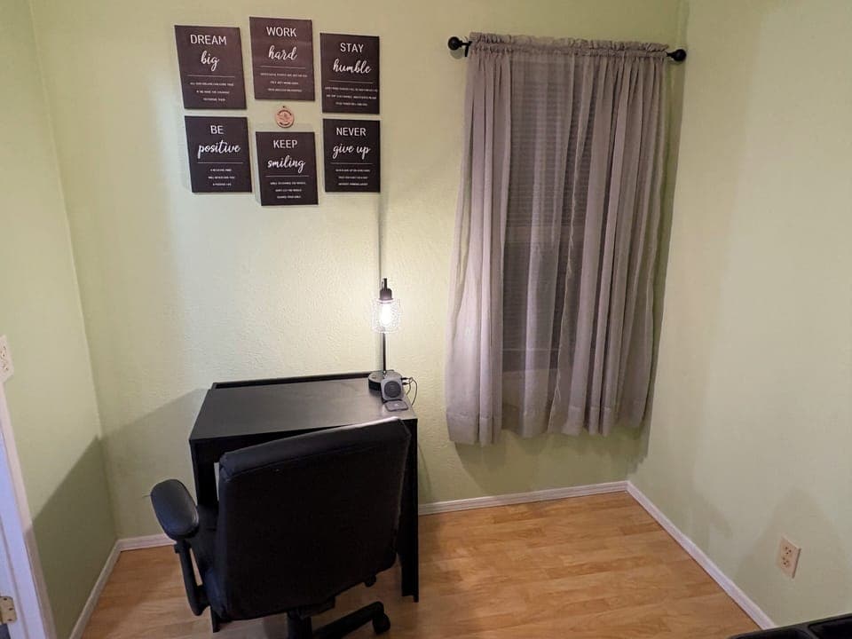 Dedicated office space with desk and chair. Move Pack-n-play out for privacy.