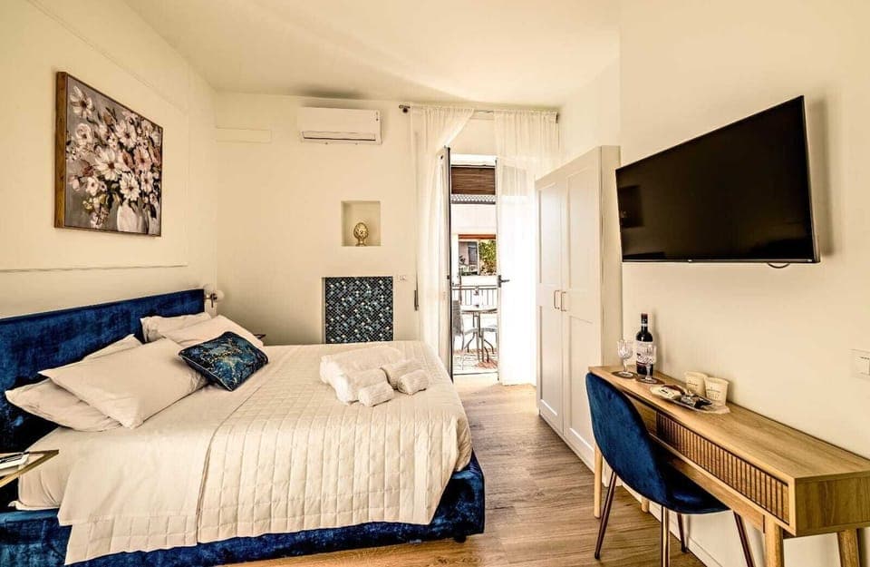 Deluxe Double Room, Balcony, City View | Free minibar, in-room safe, free WiFi