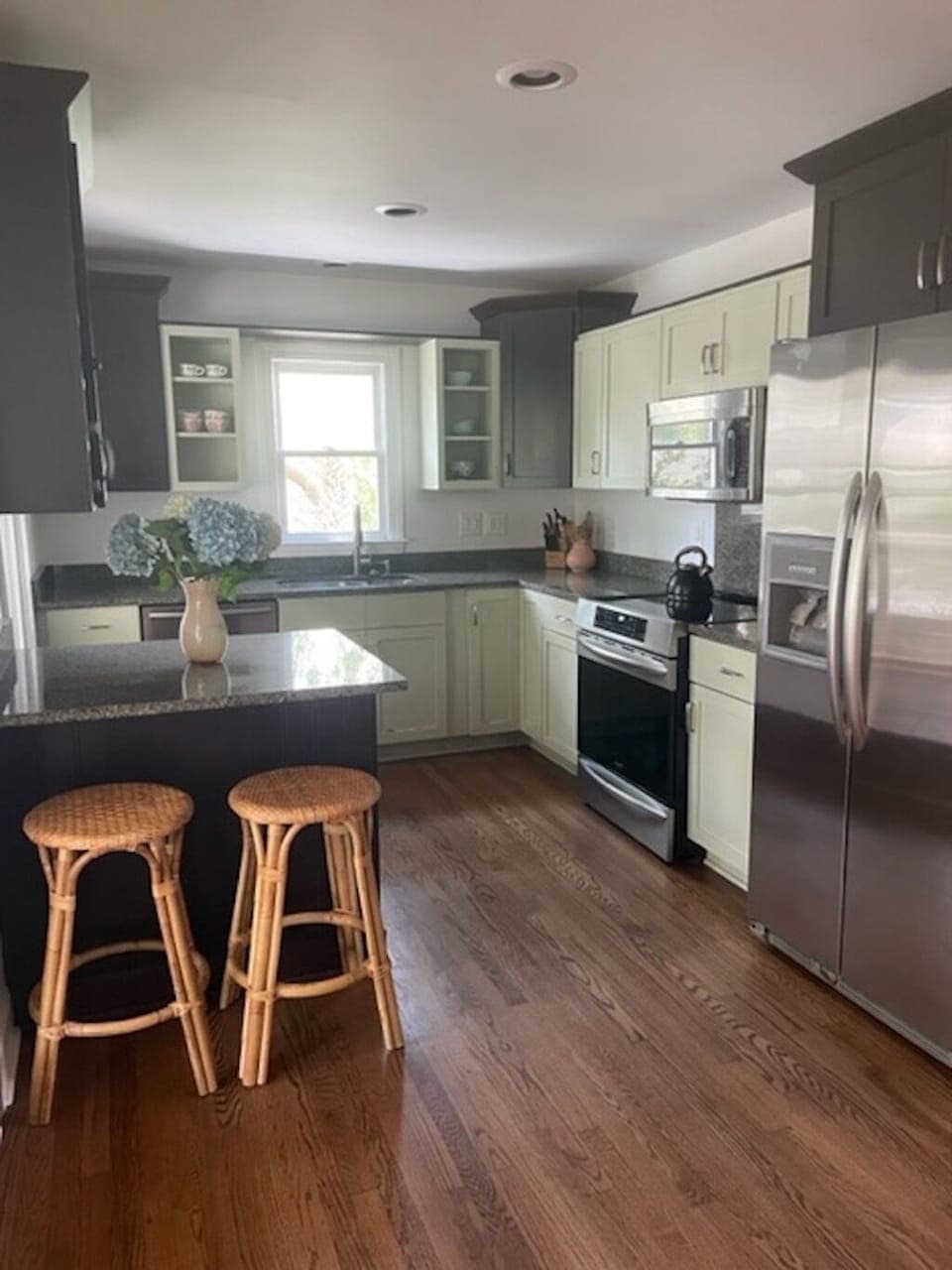 kitchen is fully stocked with cookware, dishware, etc