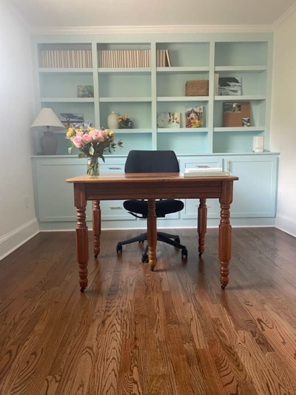upstairs bedroom with one twin bed and reading library