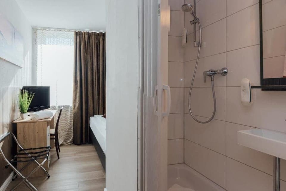Standard Single Room | Bathroom | Shower, hair dryer, towels, soap