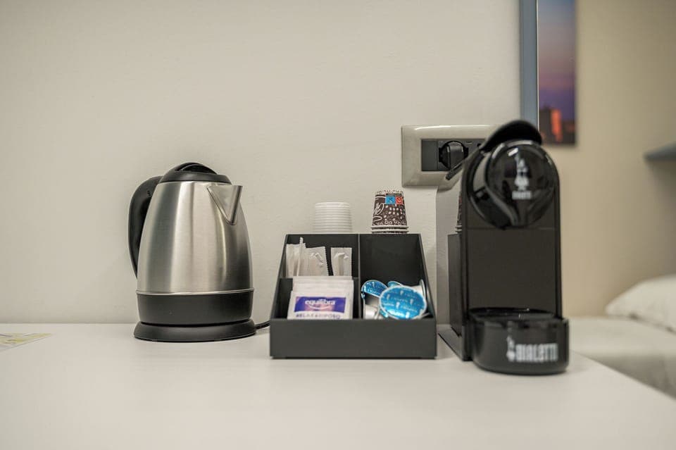 Family Triple Room, Balcony, Courtyard View | Frette Italian sheets, premium bedding, free minibar, in-room safe