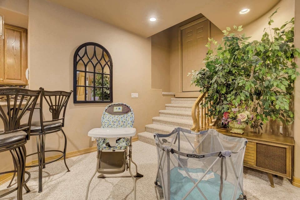 We prioritize family comfort by providing a pack-n-play and high chair for our youngest guests. These amenities are located near the kitchen and dining area, making it easy for families to enjoy their mountain getaway together.