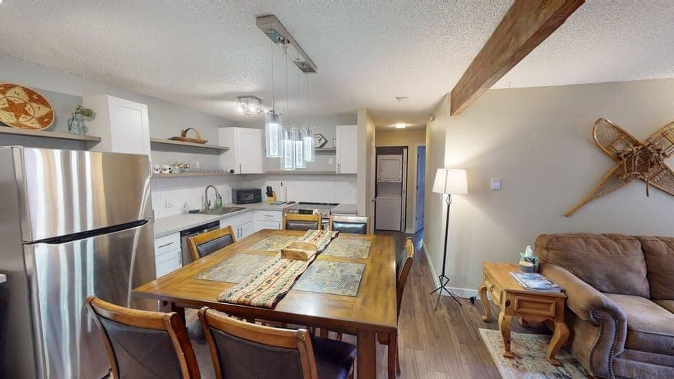 Stainless steel appliances, gleaming and modern, create a professional and inviting atmosphere, making the kitchen the heart of any gathering. Their durable construction ensures years of reliable performance