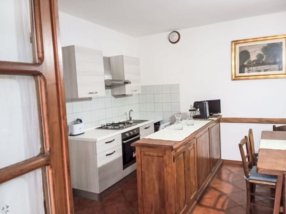 Furniture, Wood, Flooring, Cabinetry, Interior Design, Floor, Room, Countertop, Kitchen, Cupboard