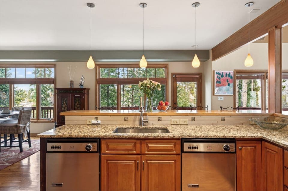 Straight-on view of the kitchen sink and prep area.