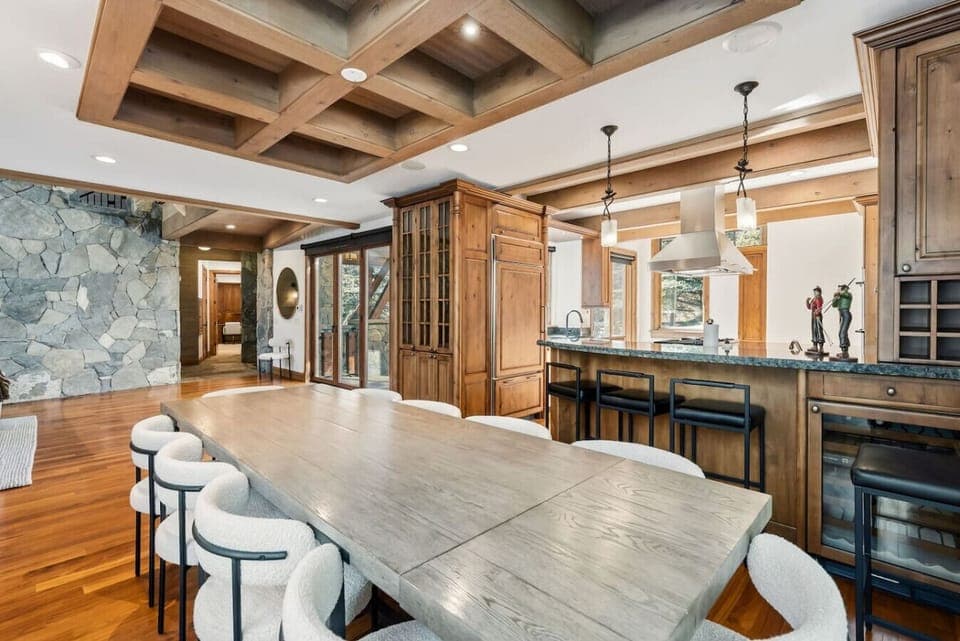 Elegant, open concept dining space with walk out patio