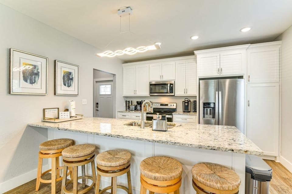 Spacious and bright kitchen with island seating