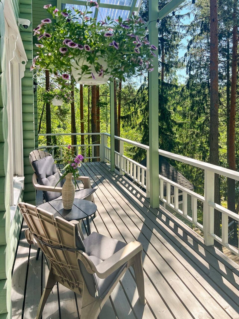 Enjoy your morning coffee in the sun – the spacious terrace opens up to a beautiful Finnish forest landscape.