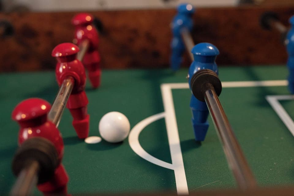 Challenge your friends to competitive foosball matches at 874 Kinnikinnick Road in your game room entertainment space.