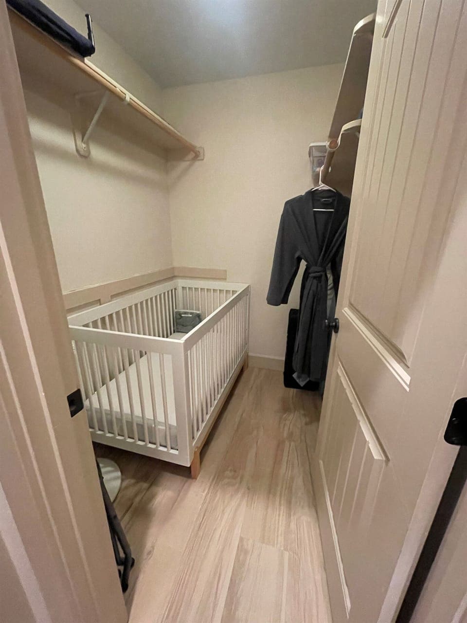 Newly added crib! Conveniently located in the primary bedroom walk-in closet for ample darkness so the babe can rest easy and the parents can easily rest. Toys, crib sheets and baby monitor included!