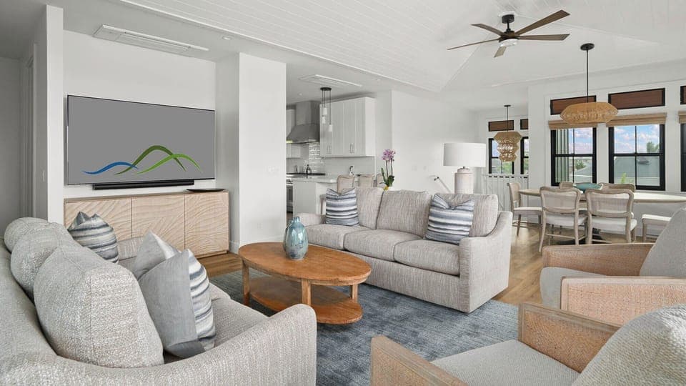 Relax in your open-concept living space with plush seating, modern kitchen, and dining area - perfect for unwinding after your adventures.