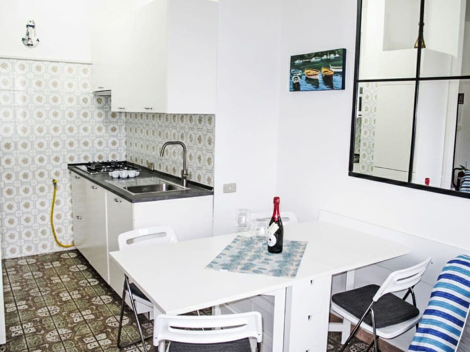 Furniture, Flooring, Interior Design, Floor, Kitchen, Major Appliance, Kitchen Appliance, Room, Chair, Countertop