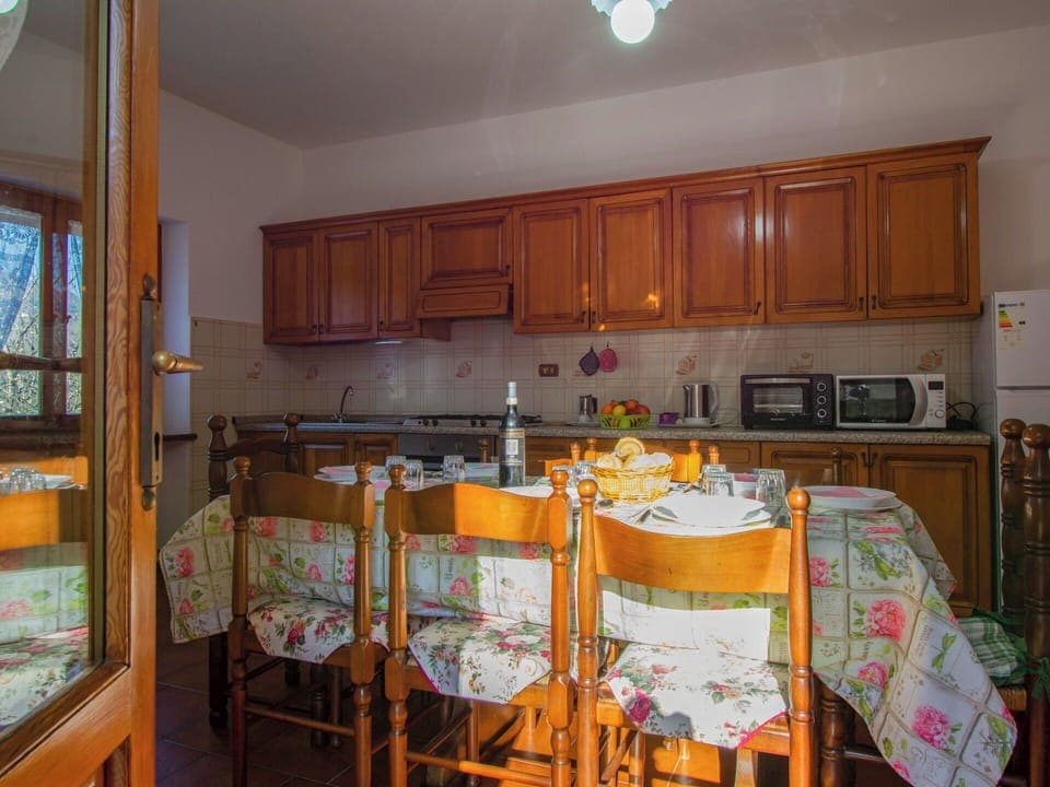 Furniture, Interior Design, Kitchen, Table, Chair, Room, Kitchen & Dining Room Table, Tablecloth, Cabinetry, Dining Room