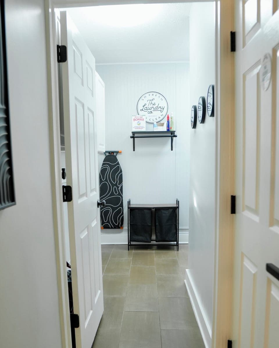Laundry Room with everything you need to do a little laundry. Need an iron or steamer, look no further!