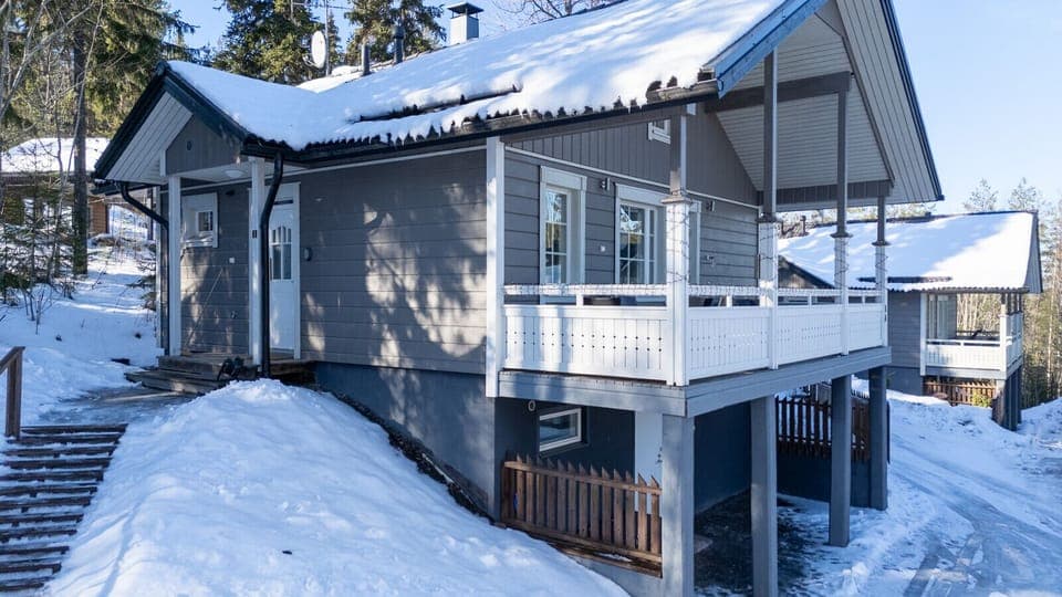 The cottage features a private entrance and convenient on-site parking, ensuring easy access even during snowy winter months.