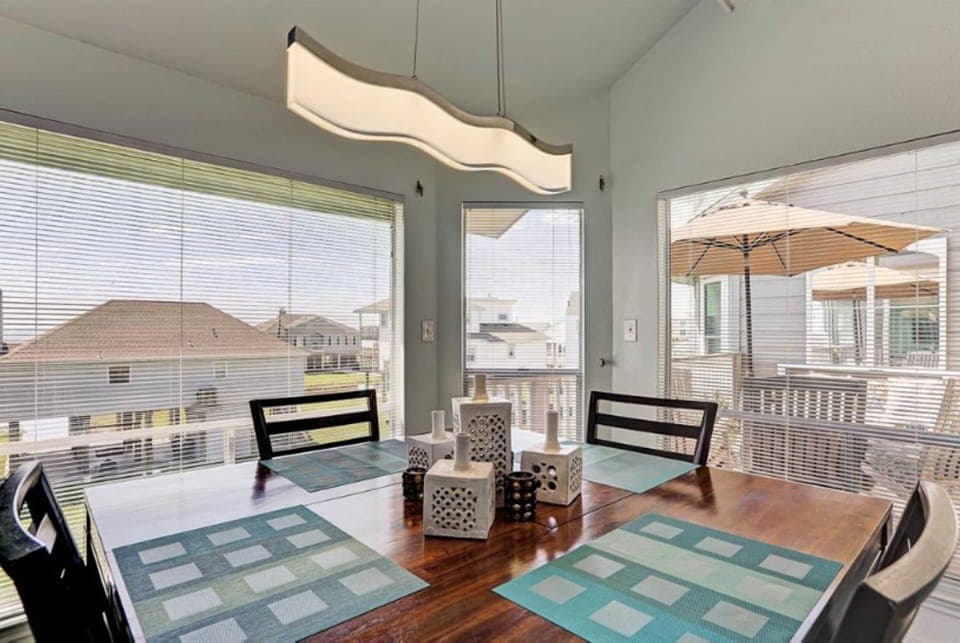 Gather around the dining table for meals, games, and quality time together