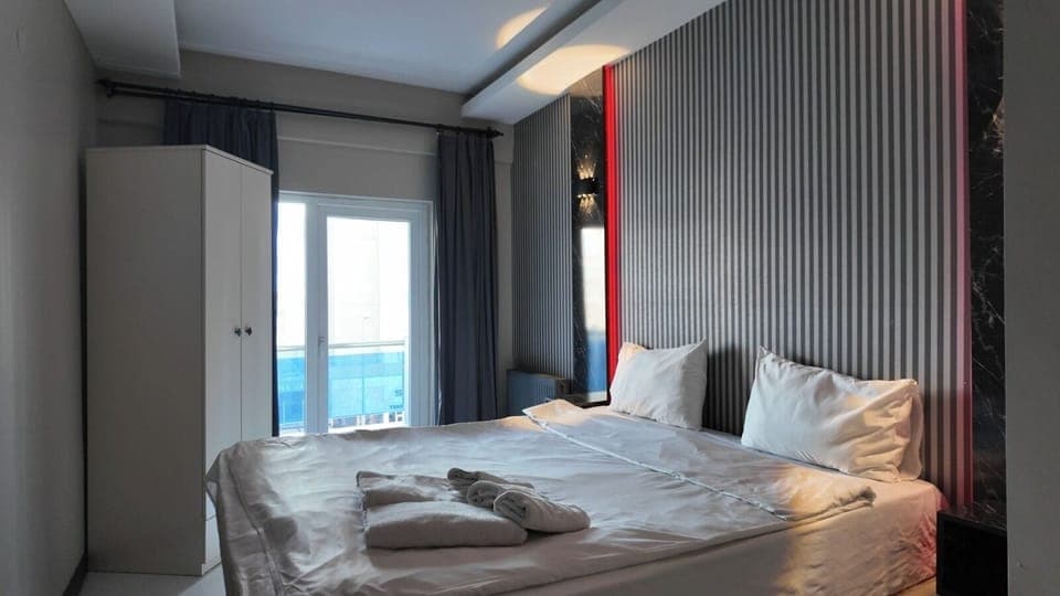 Double Room, Balcony, City View | Desk, laptop workspace, blackout drapes, soundproofing