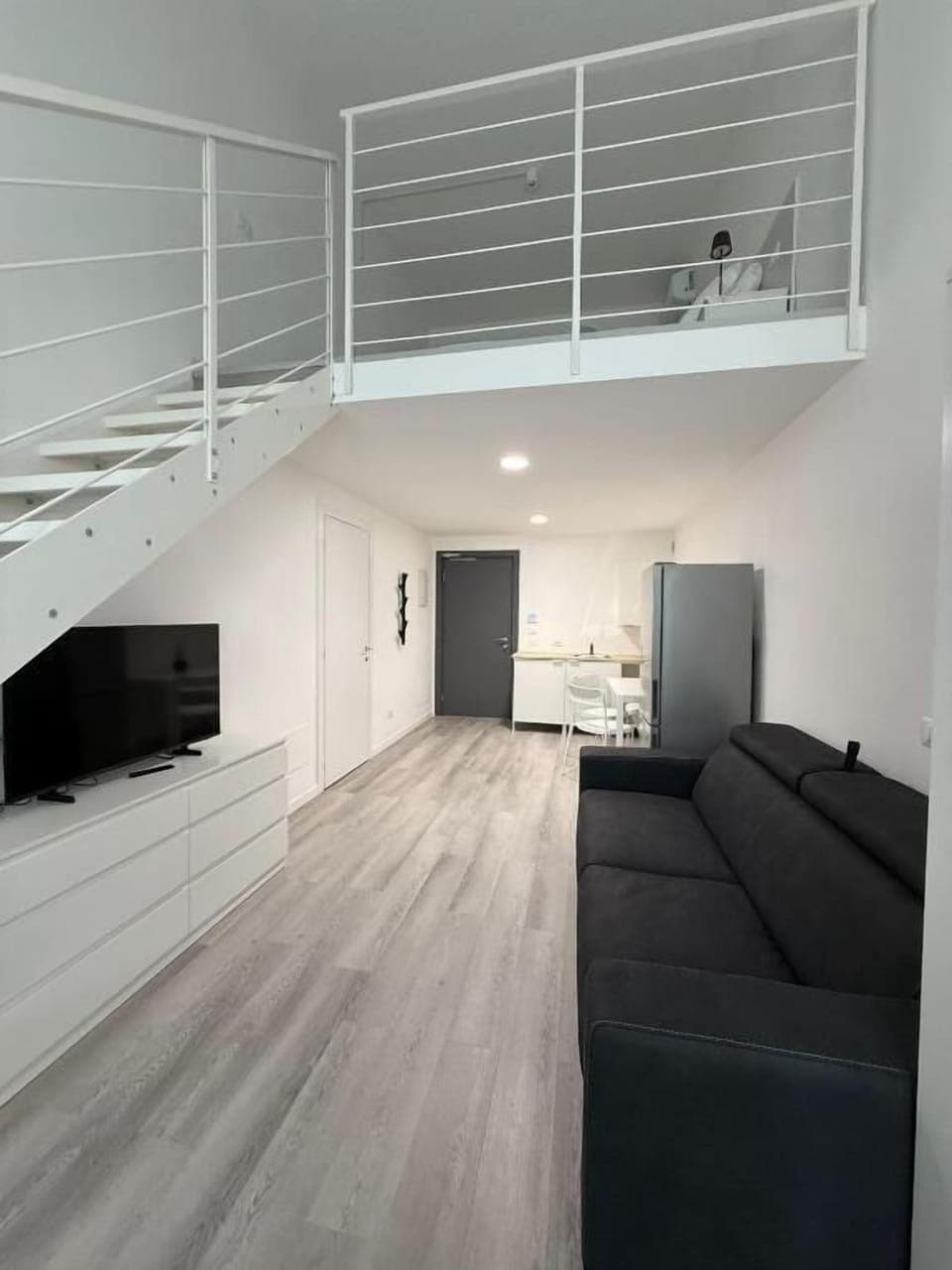 Deluxe Apartment | Living area | TV