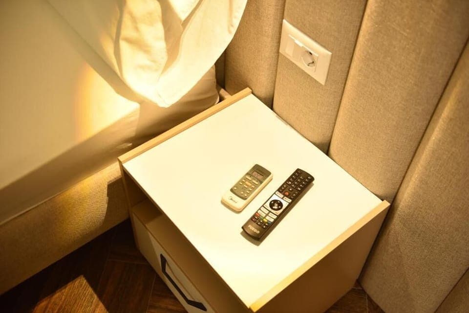 Standard Triple Room, Balcony, Garden View | Miscellaneous