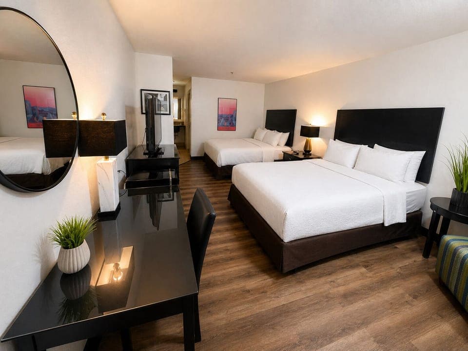 Standard Room, 2 Queen Beds, Pool View | Desk, laptop workspace, blackout drapes, free WiFi