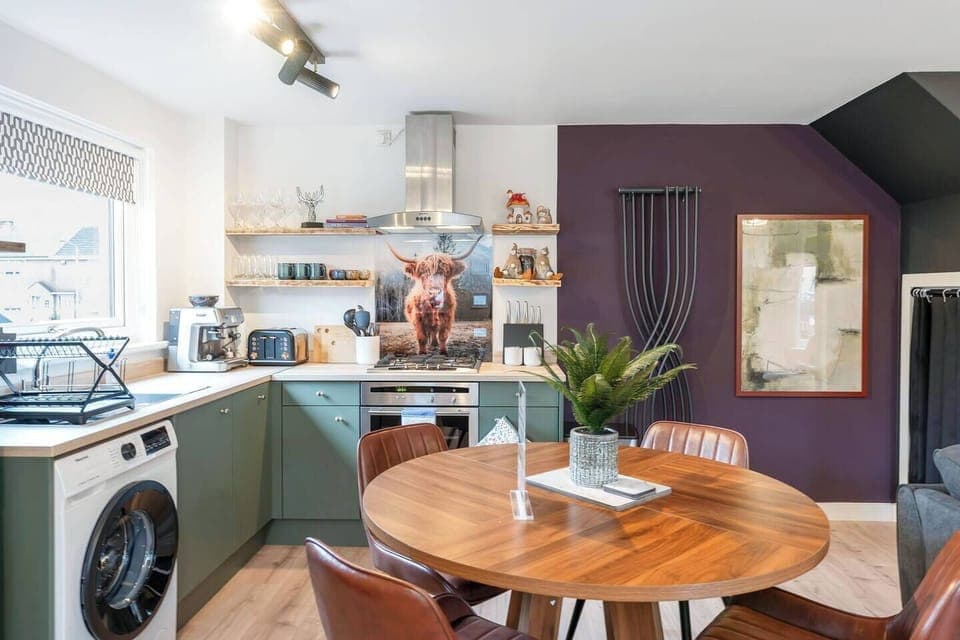 A welcoming dining space seamlessly connected to the kitchen, perfect for enjoying meals together. Bright, practical, and comfortable, it’s designed for everything from quick breakfasts to relaxed dinners, making every moment feel warm and homely.
