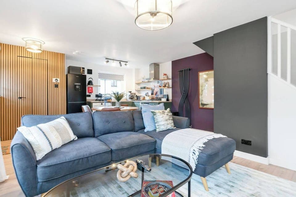 A bright and inviting living room designed for comfort and relaxation. Featuring cozy seating and a welcoming atmosphere, it’s the perfect place to unwind after a long day, enjoy a movie, or spend quality time with family and friends.