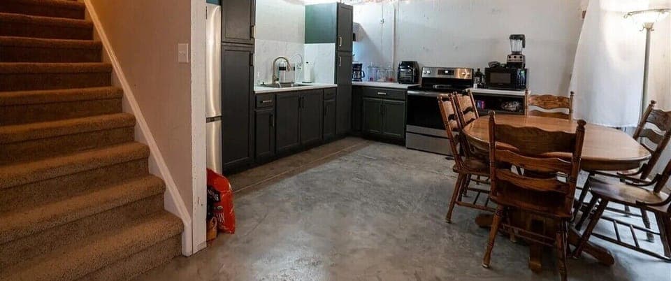 Your spacious kitchen and dining area features modern appliances and a welcoming table where you can enjoy home-cooked meals together.