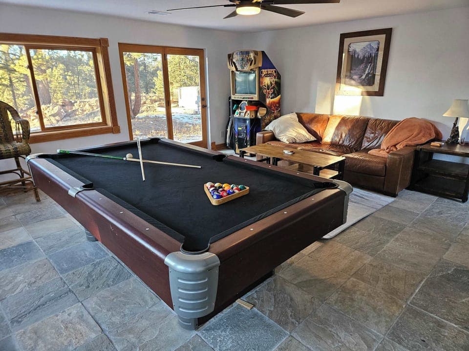 Hang out in the game room and start a billiards or Big Buck Hunter tournament.