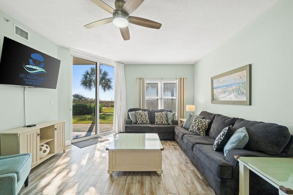 Living Area – Sleeper Sofa - Ground Floor - Courtyard View - Cable & Smart TV