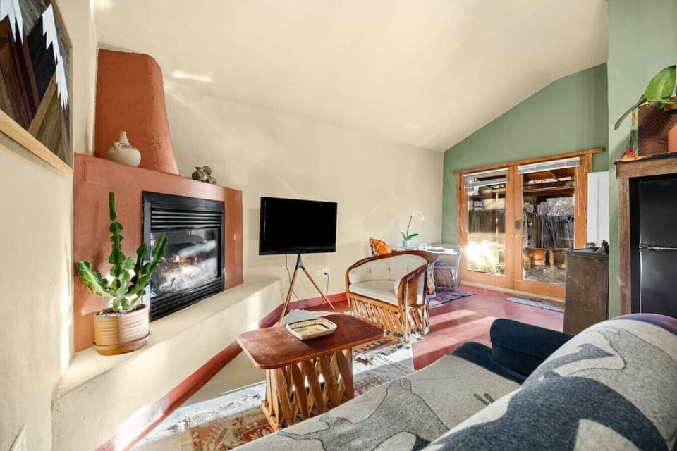 Living room with stylish western flare, flooded with natural light!