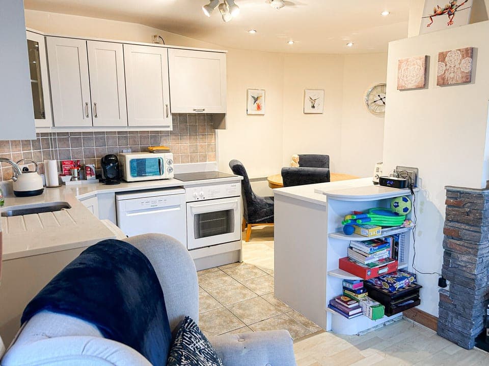 Glasson Mews Holiday Home No. 2. Compact kitchen open plan to living room
