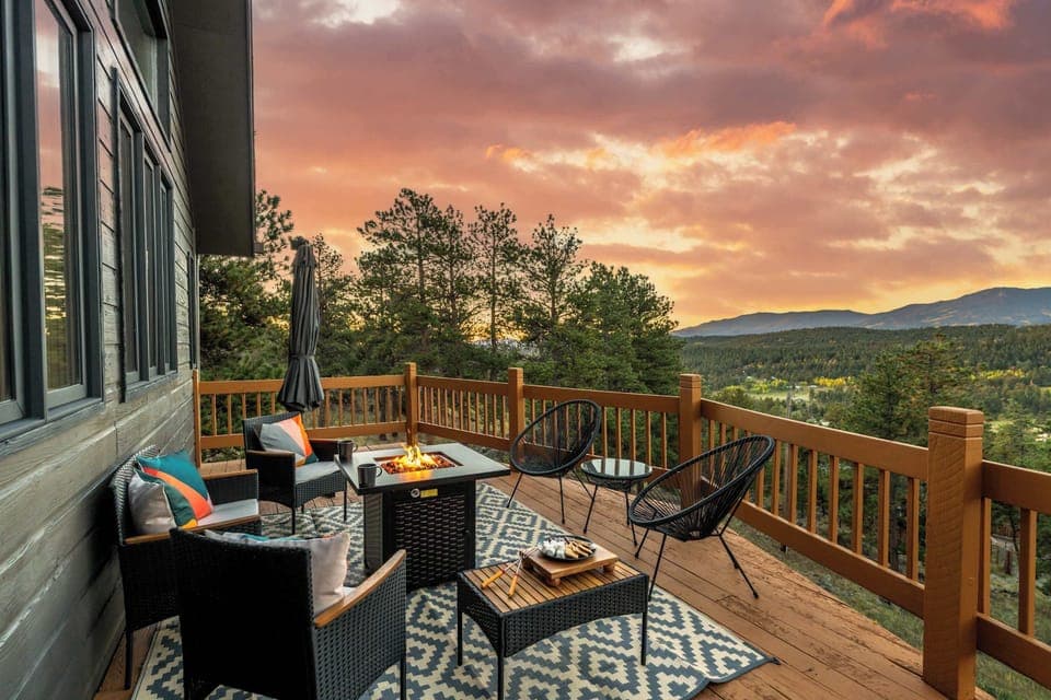 Smor'es and sunsets on the deck with fire table and sun umbrella.