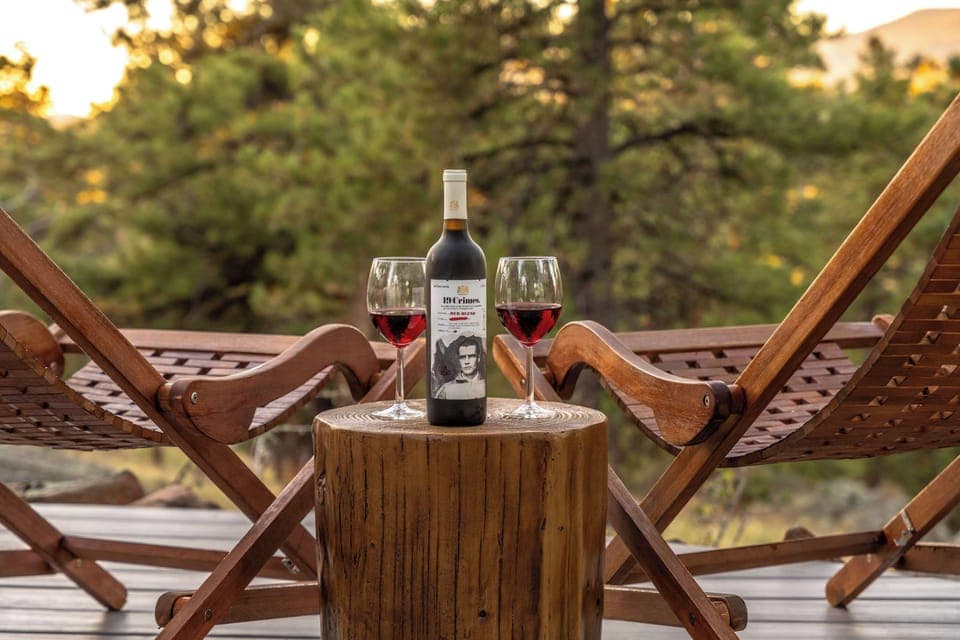 Deck Lounging at its Finest – Settle into the chairs beside the hot tub and toast the mountains as the sun fades to gold.