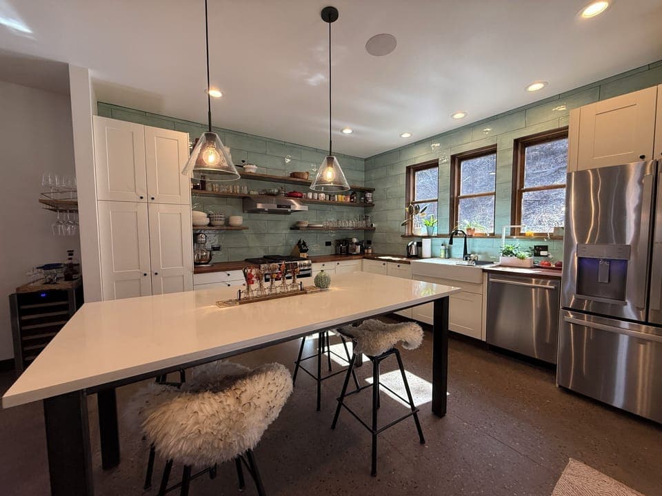 Kitchen with Restoration Hardware lights, filtered water, exposed shelves, mixer