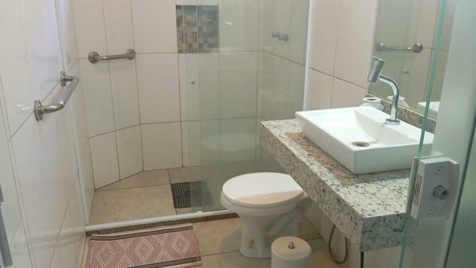 Shower, towels, soap, toilet paper