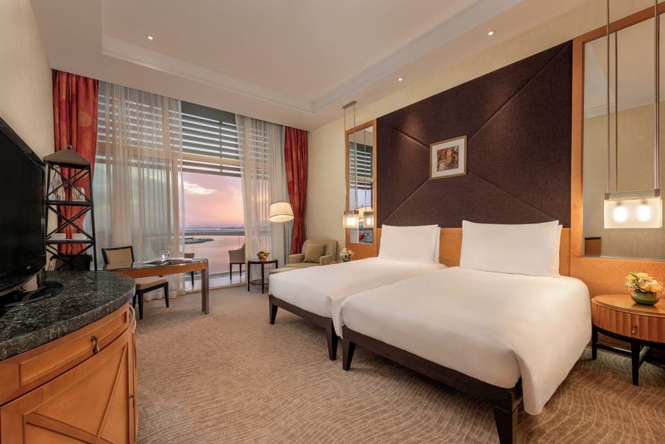 Egyptian cotton sheets, premium bedding, down comforters, minibar