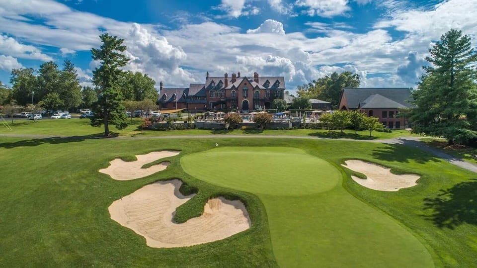 Arrive to sweeping fairway views and a grand clubhouse backdrop.