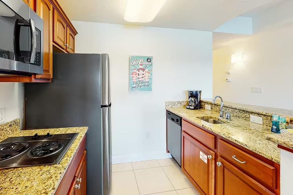 Condo, 1 King Bed with Sofa bed (Carillon Beach Inn 310) | Private kitchen